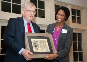 Taiisa Kelly presents framed quote to Richard W. Brown