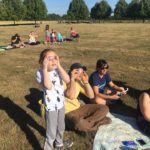 Family Watching Solar Eclipse