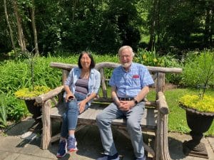 Donna and I are Sitting on one of Jan's Benches