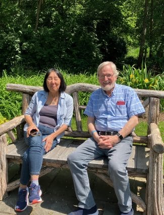 Donna and I Sitting on one of Jan's Benches