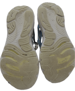 The Worn Soles of My Shoes